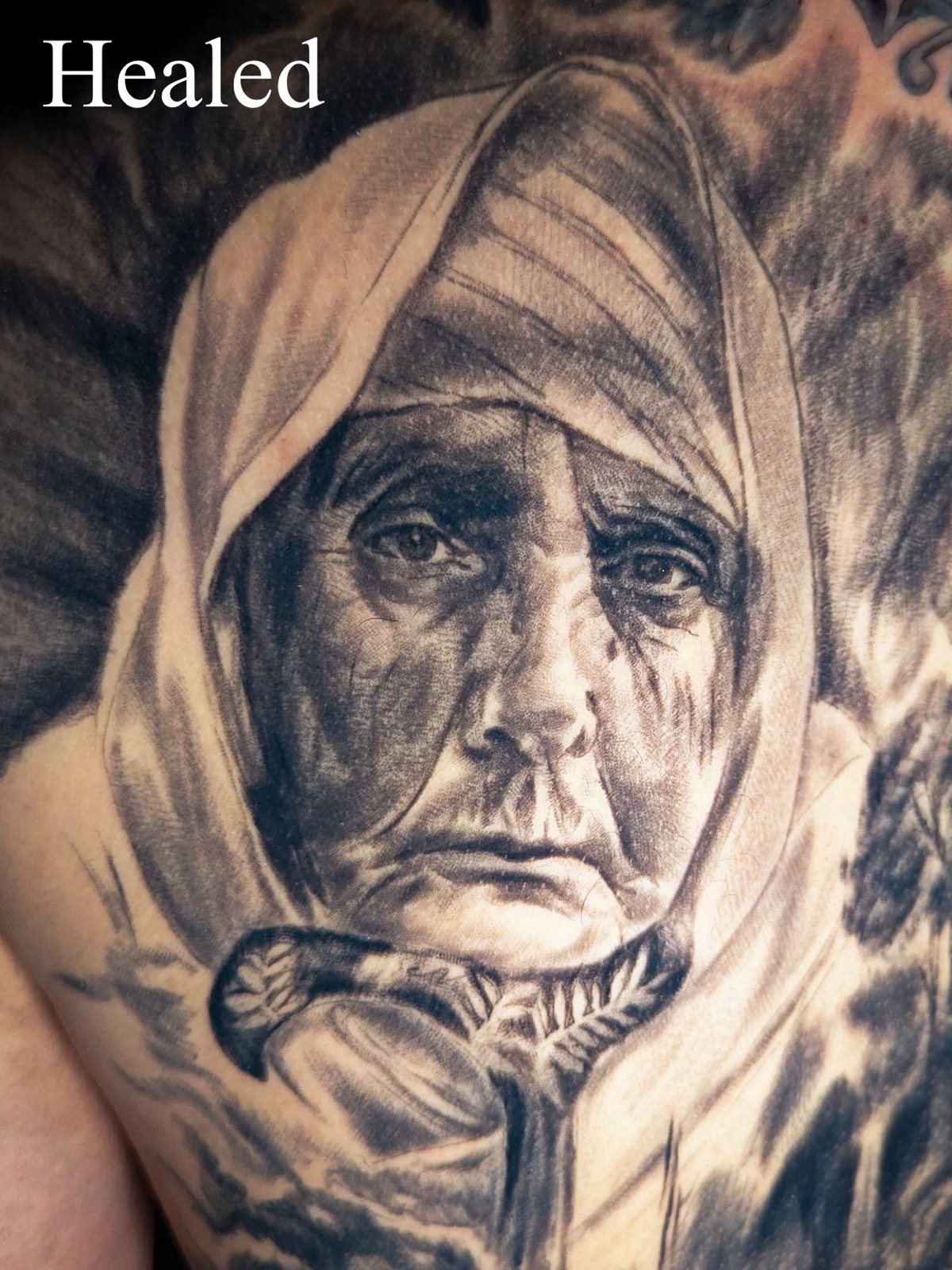 Hyper-realistic portrait tattoo